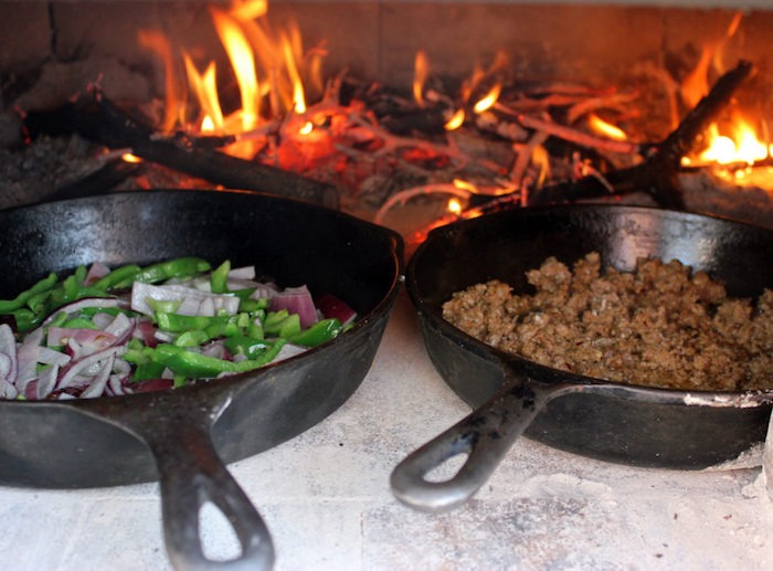 One might think that an off-grid life is one of deprivation. That food would be basic and boring. But the authors of this book prove that it’s anything but. With their homebuilt outdoor pizza oven, meals include home-baked bread, wood-fired pizza, roasted chicken and so much more.