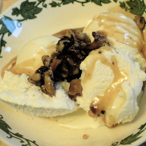 maple walnut topping over vanilla ice cream