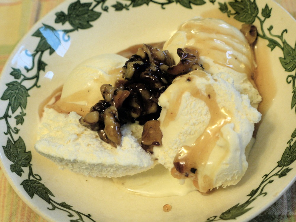 maple walnut topping over vanilla ice cream